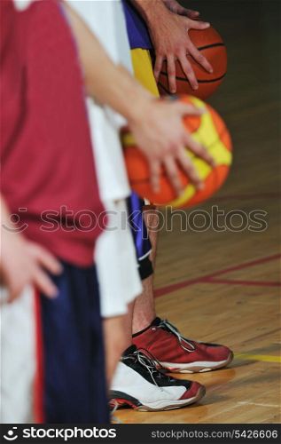 basket ball players team portrait in hi-school sport gym