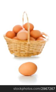 Basket full of eggs isolated on white