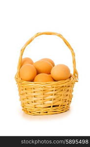 Basket full of eggs isolated on white