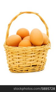 Basket full of eggs isolated on white