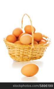 Basket full of eggs isolated on white