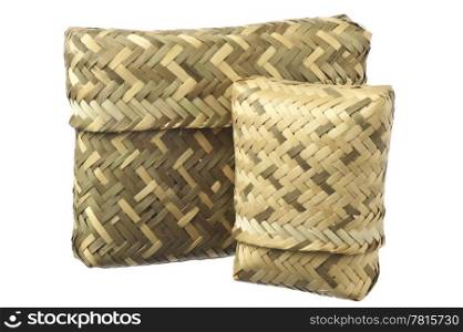 basket in a natural fibers woven on a white background