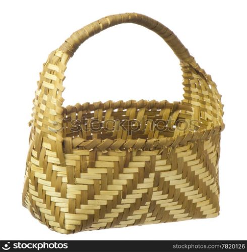 basket in a natural fibers woven on a white background