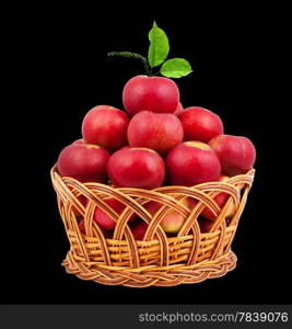 Basket of apples isolated on a black background