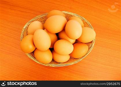 Basket of eggs on the colourful background