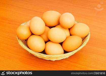 Basket of eggs on the colourful background