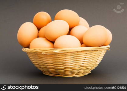 Basket of eggs on the colourful background