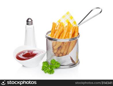Basket of freshly made southern fries with ketchup and salt yellow paper on white studio background