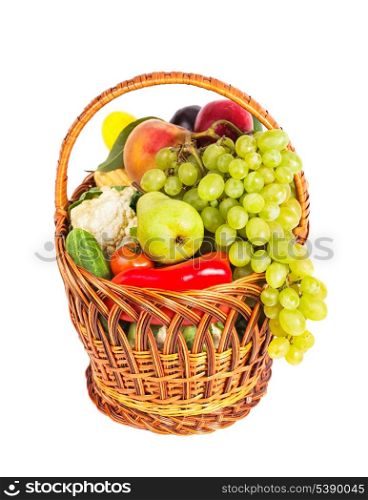 Basket of vegetables and fruits isolated on white