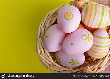 basket wicker with decoration easter eggs