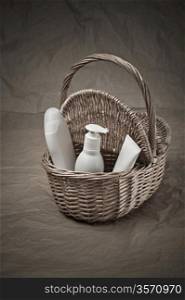 basket with bottles and tube