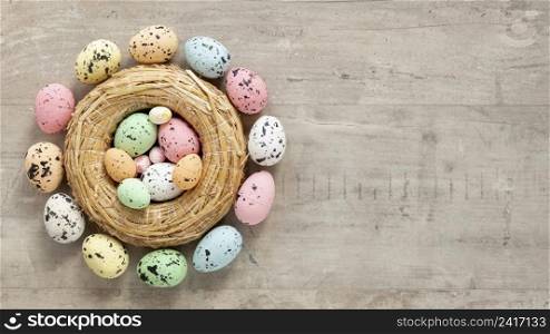 basket with colorful painted eggs easter