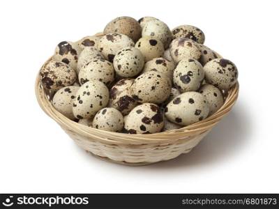 Basket with fresh raw Quail eggs on white background