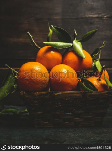 Basket with Fresh tangerines , side view