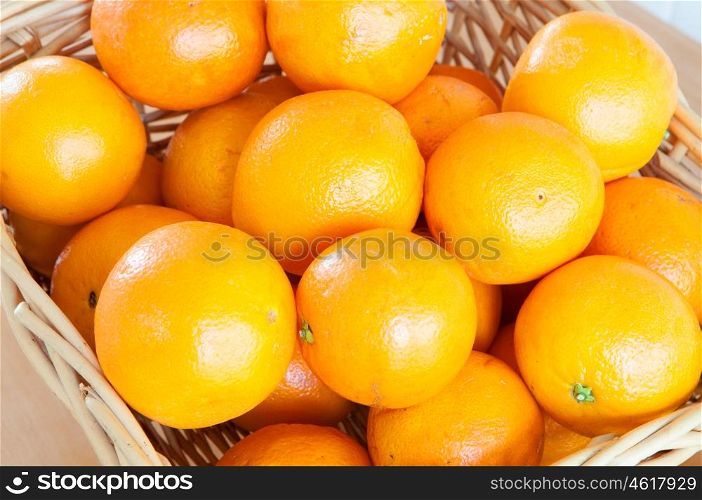 Basket with oranges. A tasty and healthy fruit