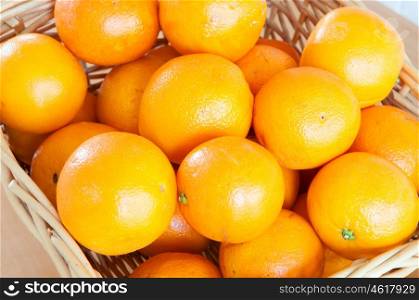 Basket with oranges. A tasty and healthy fruit