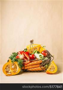 Basket with organic harvest vegetables and pumpkin from garden. Autumn seasonal food concept