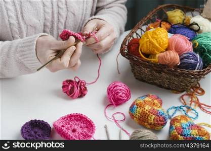 basket wool balls woman weaving