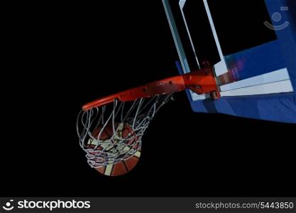 Basketball ball, board and net on black background in gym indoor