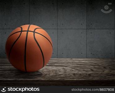 Basketball balls for sports and games are placed on a wooden table with a dark cement wall