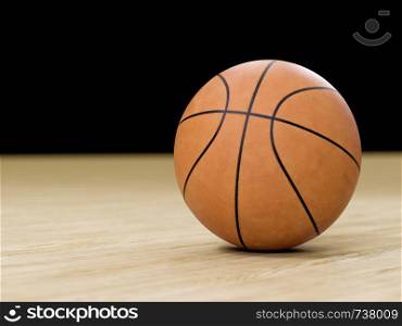 Basketball court wooden floor with ball isolated on black with copy-space