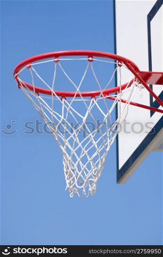 basketball hoop over a blue sky