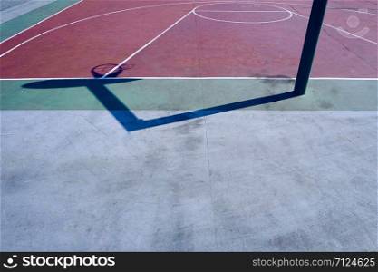 basketball hoop shadow silhouette on the court on the street