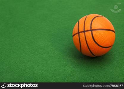 Basketball on green background