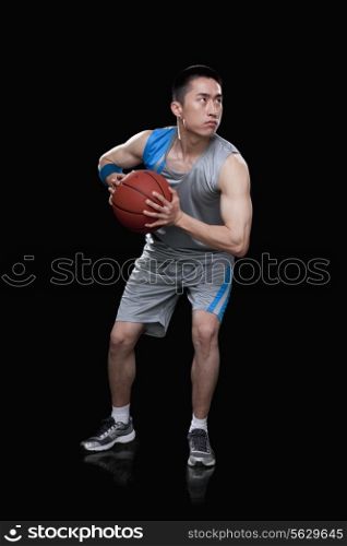 Basketball player, black background