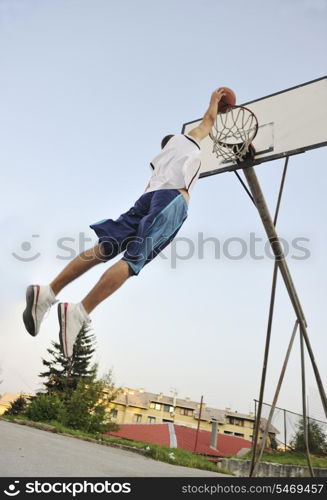 basketball player practicing and posing for basketball and sports athlete concept