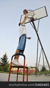 basketball player practicing and posing for basketball and sports athlete concept