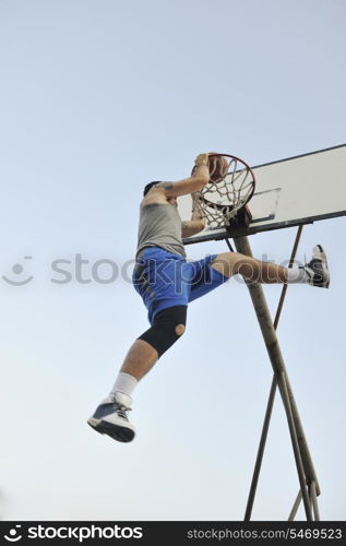 basketball player practicing and posing for basketball and sports athlete concept