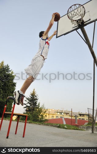 basketball player practicing and posing for basketball and sports athlete concept