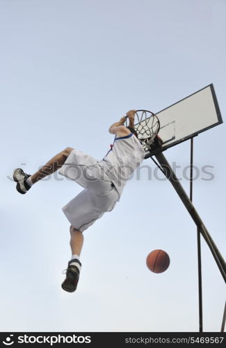 basketball player practicing and posing for basketball and sports athlete concept