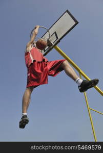 basketball player practicing and posing for basketball and sports athlete concept