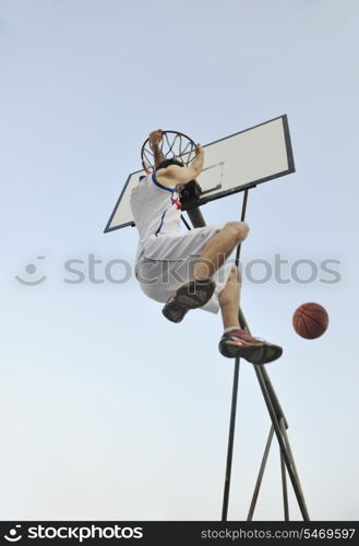 basketball player practicing and posing for basketball and sports athlete concept