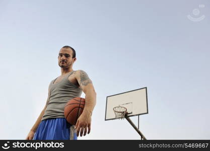 basketball player practicing and posing for basketball and sports athlete concept