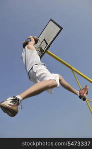 basketball player practicing and posing for basketball and sports athlete concept