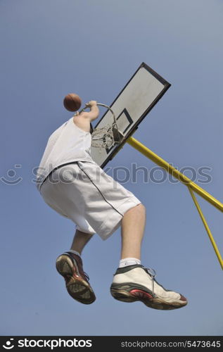 basketball player practicing and posing for basketball and sports athlete concept