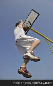 basketball player practicing and posing for basketball and sports athlete concept