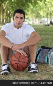 Basketball player sitting