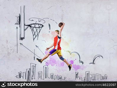 Basketball player. Young man basketball player throwing ball in basket