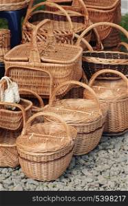 Basketry market on nature. Green field background.