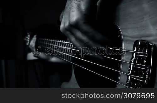 Bass Guitar Palayer Playing In Studio