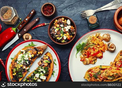 Batata stuffed with vegetables and cottage cheese and baked in halves. Diet food, baked vegetable, sweet potato. Sweet potato stuffed with vegetables and cottage cheese.