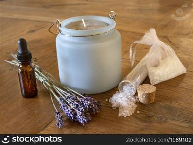 bath salts and lavender on a wood table