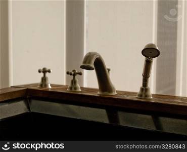 Bath taps and shower nozzel