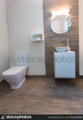 Bathroom toilet with round mirror modern indoor with ceramic stone