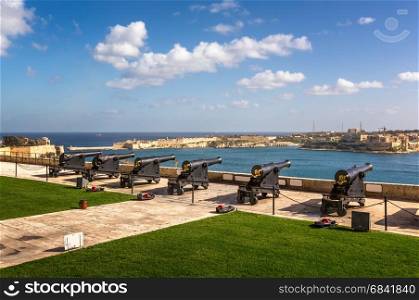 Battery of Cannons facing Harbor in Upper Barrakka Gardens in Valletta, Malta