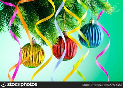 Baubles on christmas tree in celebration concept